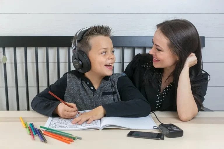 Behaviour support practitioner working one-on-one with a participant