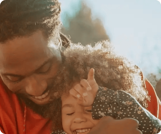 A top-down view of a person using a silver compass over a detailed map, symbolizing the guidance and direction Jango Community Services provides to help participants navigate their NDIS plans and achieve their life goals.