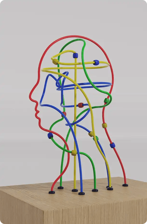 A colorful bead maze wire sculpture in the shape of a human profile, representing Jango's specialized NDIS support for cognitive development and mental well-being.